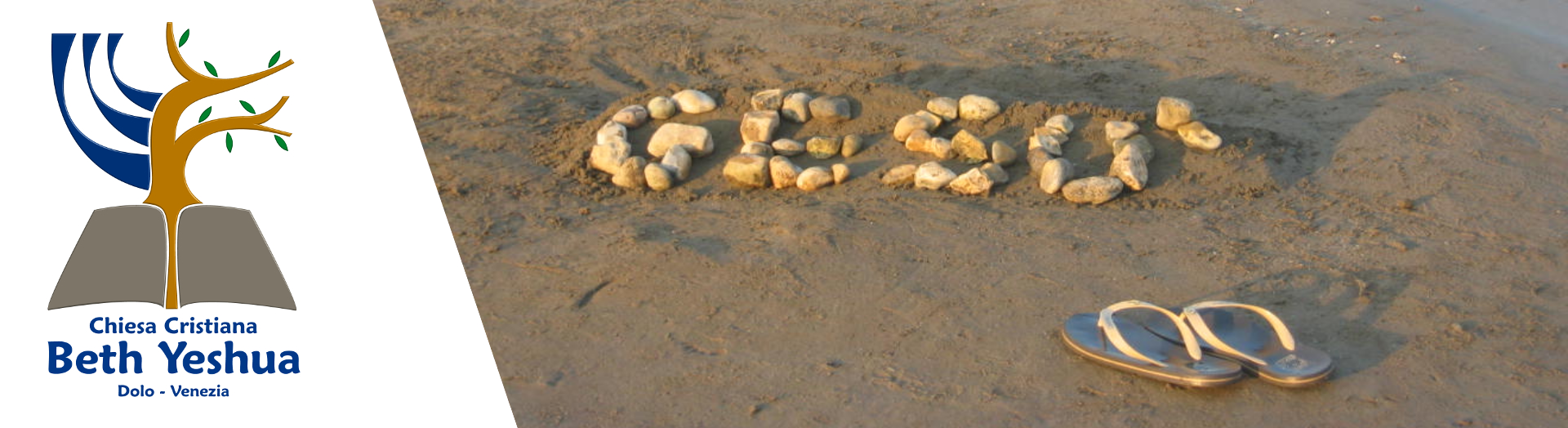 Scritta Gesù sulla sabbia